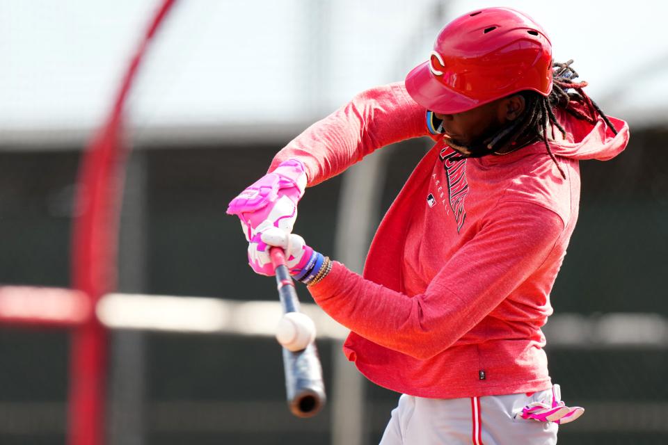 Cincinnati Reds third baseman Elly De La Cruz (44) makes contact on a pitch during live batting practice during spring training workouts, Wednesday, Feb. 21, 2024, at the team’s spring training facility in Goodyear, Ariz.