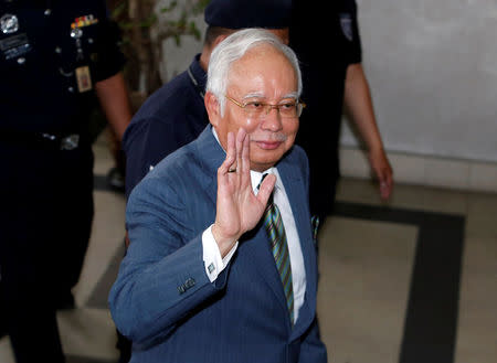 Malaysia's former prime minister Najib Razak arrives in court in Kuala Lumpur, Malaysia August 8, 2018. REUTERS/Lai Seng Sin