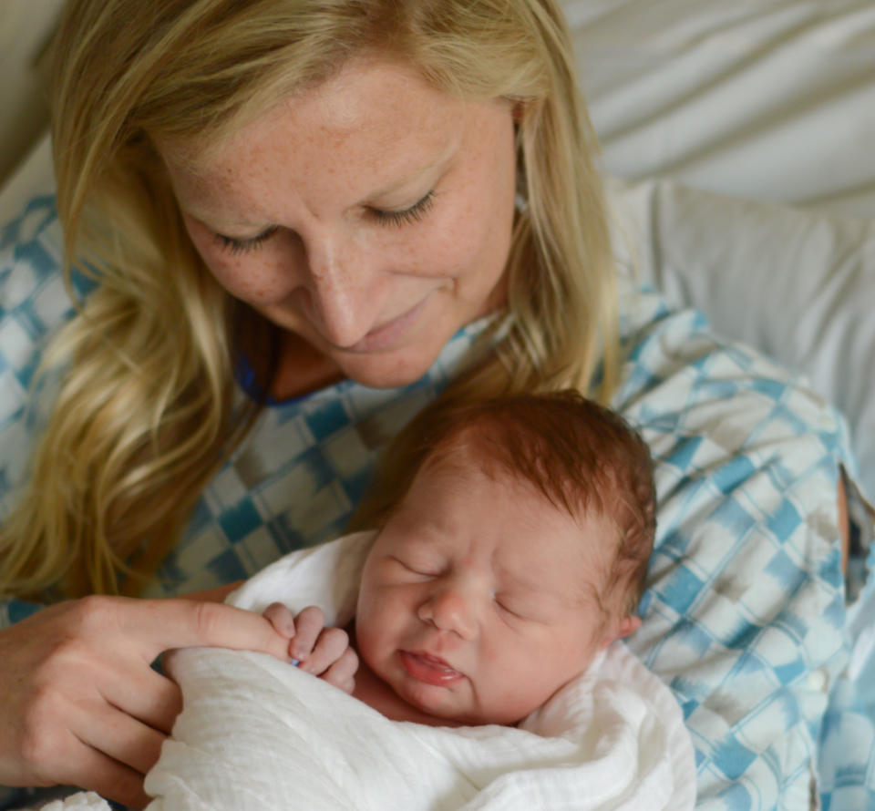 Fantasy Football diehard Sara Alton with newborn son, Woods Alton. (Photo courtesy of the Alton family)