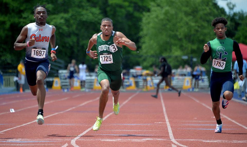 South Hagerstown's Cole Schlotterbeck, center, finishes third in the Class 3A boys 100-meter dash during the Maryland State Track & Field Championships at the Prince George's Sports & Learning Complex in Landover, Md., Saturday.