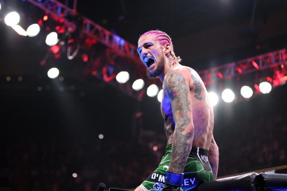 BOSTON, MASSACHUSETTS - AUGUST 19: Sean O’Malley celebrates after defeating Aljamain Sterling during their Bantamweight title fight at UFC 292 at TD Garden on August 19, 2023 in Boston, Massachusetts. (Photo by Paul Rutherford/Getty Images)