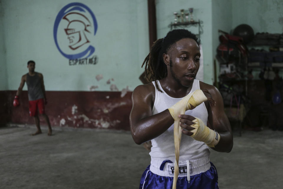 Transgender Cuban athlete Ely Malik Reyes, who practices mixed martial arts known as sanda, trains at a gym in Regla, across the bay from Havana, Cuba, Tuesday, June 11, 2024. Reyes became the first trans athlete to officially compete in a Cuban league. (AP Photo/Ariel Ley)