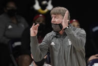 North Carolina State head coach Wes Moore directs his players during the second half of an NCAA college basketball game against North Carolina in Chapel Hill, N.C., Sunday, Feb. 7, 2021. (AP Photo/Gerry Broome)