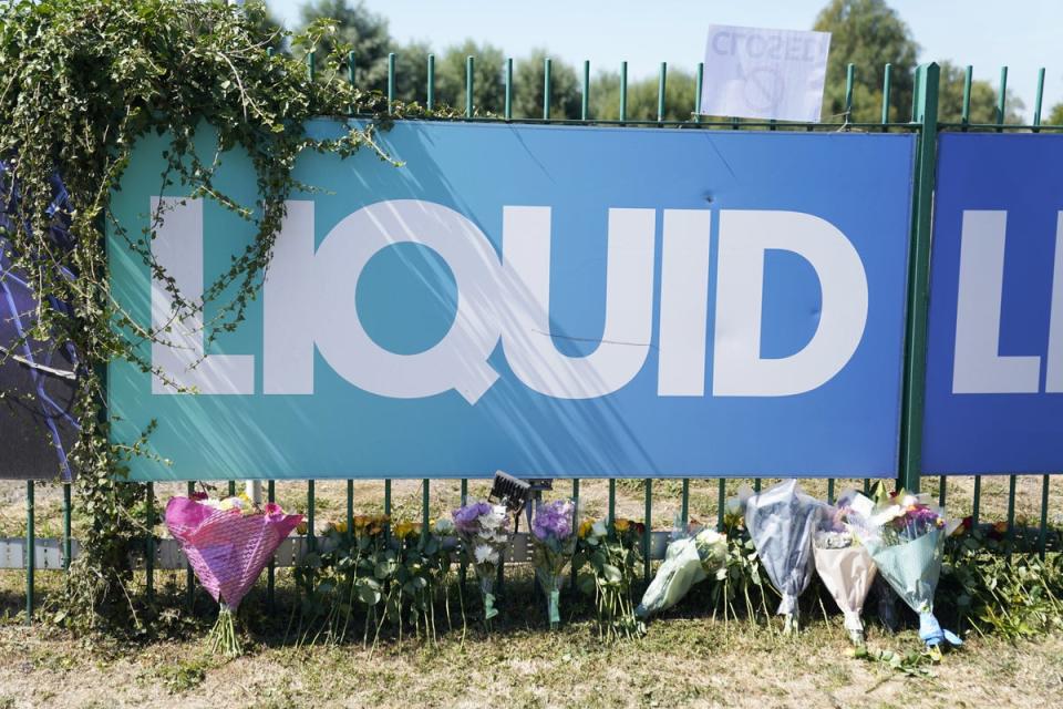 Flowers were left outside Liquid Leisure following the youngster’s death (PA) (PA Wire)