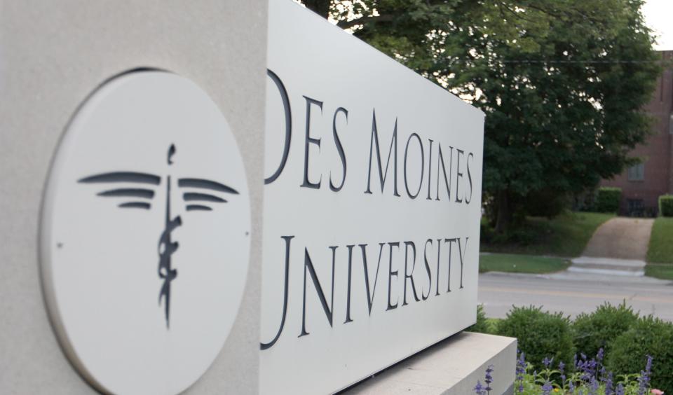 Neighbors are fighting Des Moines University's plans to add 45 parking spaces on the school's campus over worries about flooding.