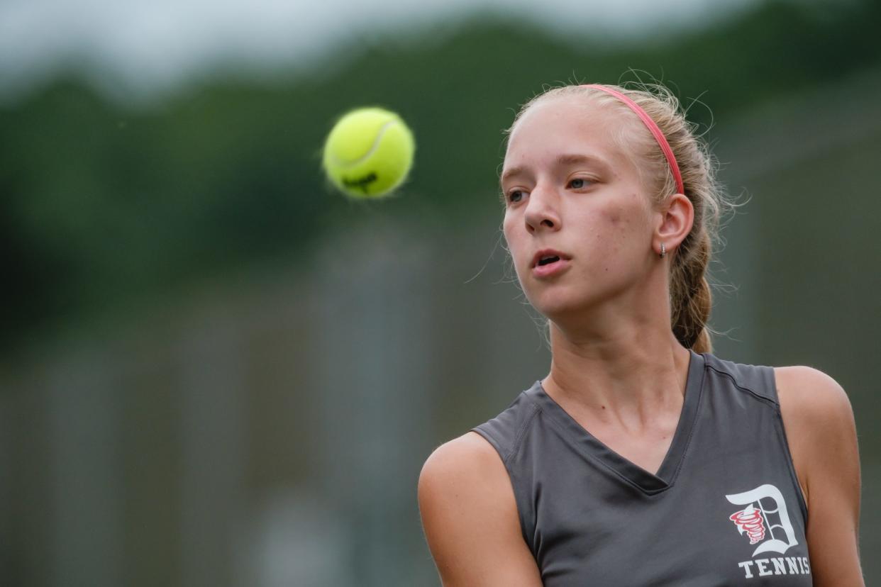 Dover's Taylor Rose eyes a return during their match against Marietta, Tuesday, Aug. 9 at Dover City Park.