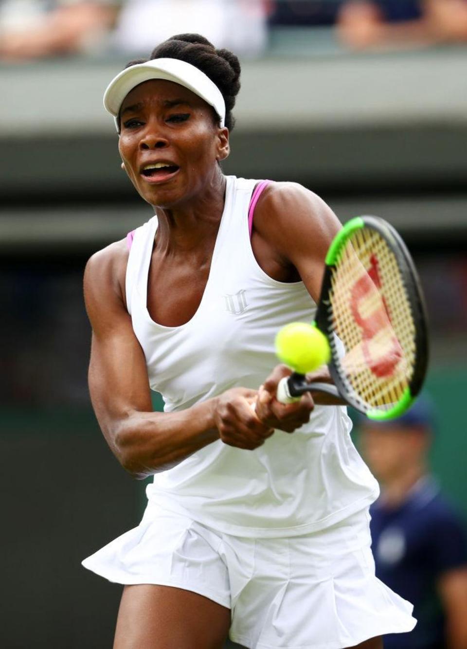 Venus Williams' pink bra straps become visible during a match (Getty Images)