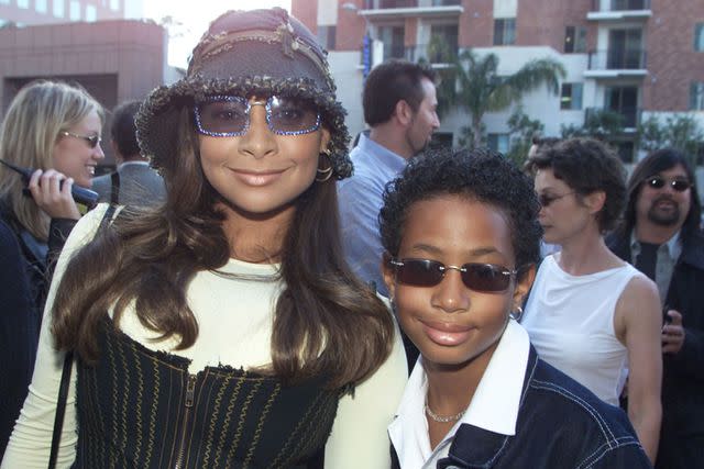 <p>Kevin Winter/Getty</p> Raven-Symoné and brother Blaize attend the Dr. Dolittle 2 premiere in 2001.