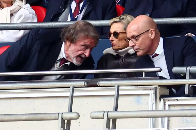 Sir Jim Ratcliffe leans over to speak to Sir David Brailsford during Manchester United's FA Cup semi-final win over Coventry City at Wembley.