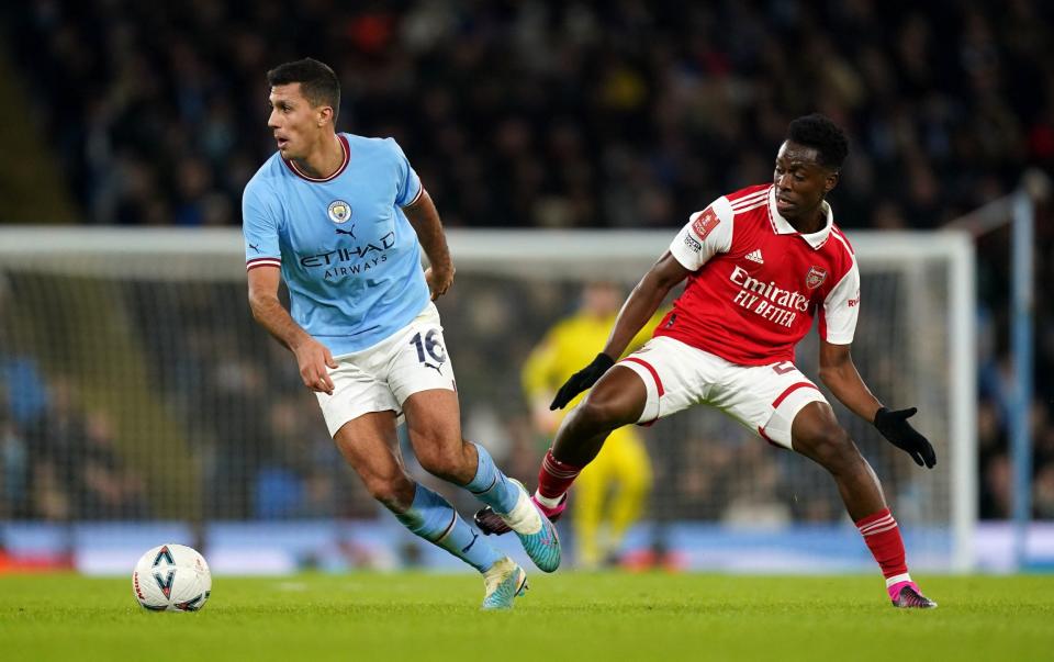 Rodri surges away from Arsenal's Albert Sambi Lokonga - Mike Egerton/PA