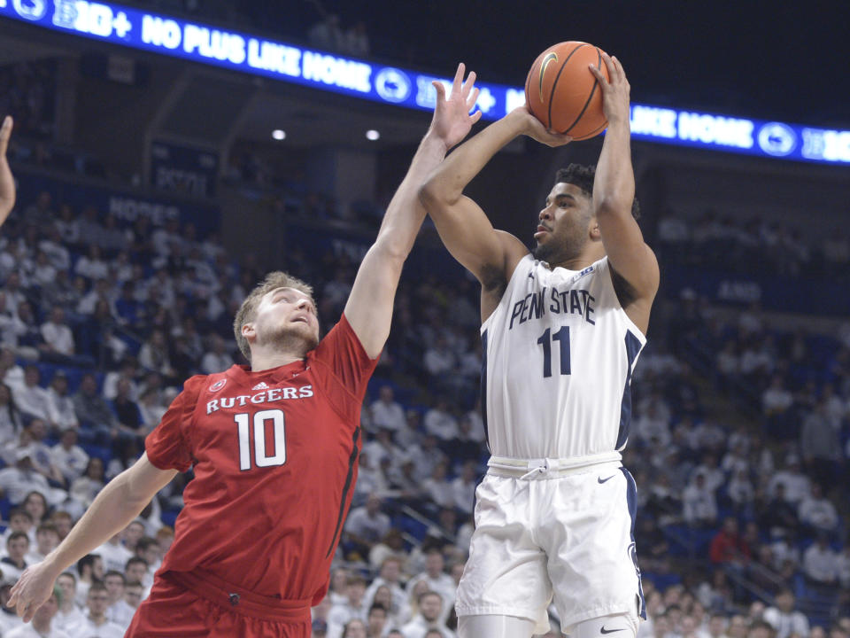Rutgers' Cam Spencer (10) defends as Penn State's Camren Wynter (11) pulls up to shoot during the first half of an NCAA college basketball game, Sunday, Feb. 26, 2023, in State College, Pa. (AP Photo/Gary M. Baranec)