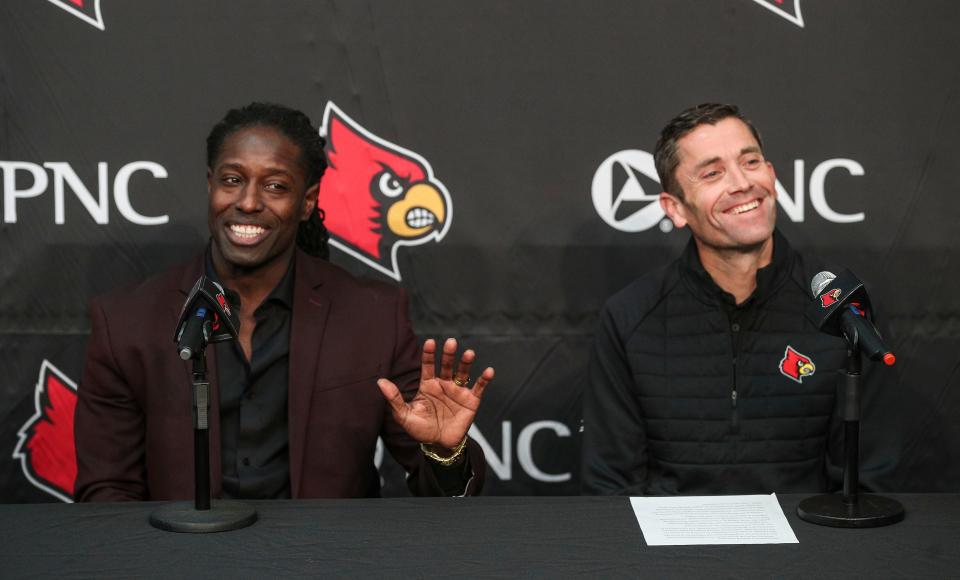 Louisville AD Josh Heird laughs as Louisville interim head football coach Deion Branch talks about taking the position Monday afternoon, just a few hours after former coach Scott Satterfield was announced as head coach at Cincinnati. Branch said he is only coaching the upcoming Fenway Bowl game; Branch is currently director of player development for UofL. Dec. 5, 2022