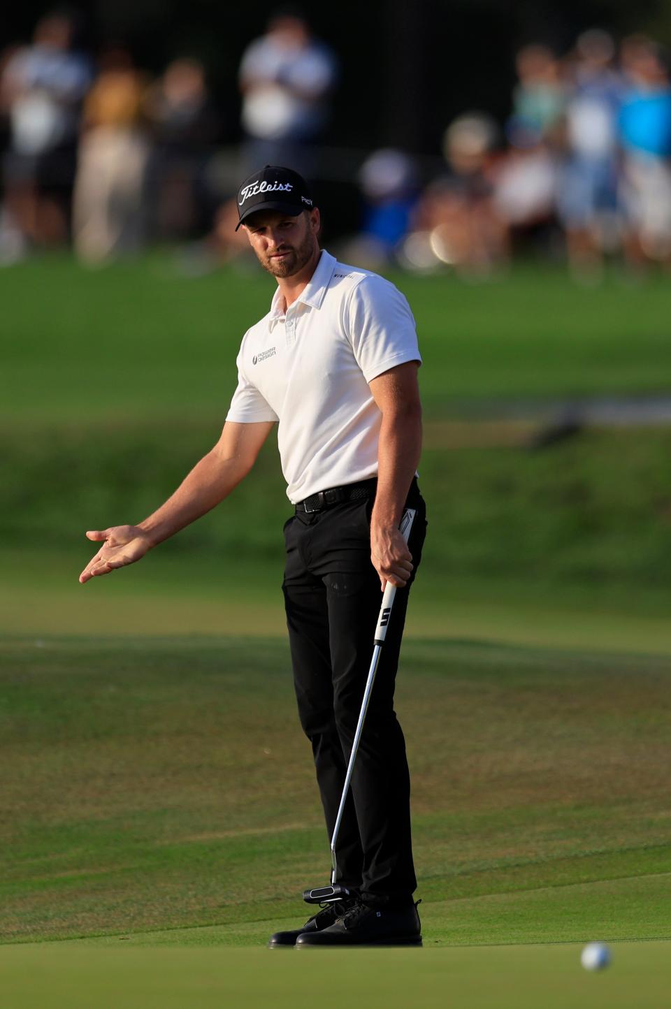 Wyndham Clark reacts to a missed eagle-putt attempt at the 16th hole of the Players Stadium Course at TPC Sawgrass during Saturday's third round of The Players Championship.