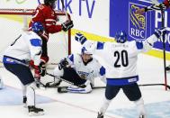 Finland's Artturi Lehkonen (C) celebrates his goal on Canada with teammates Saku Maenalanen (L) and Teuvo Teravainen (20) during the second period of their IIHF World Junior Championship ice hockey game in Malmo, Sweden, January 4, 2014. REUTERS/Alexander Demianchuk (SWEDEN - Tags: SPORT ICE HOCKEY)