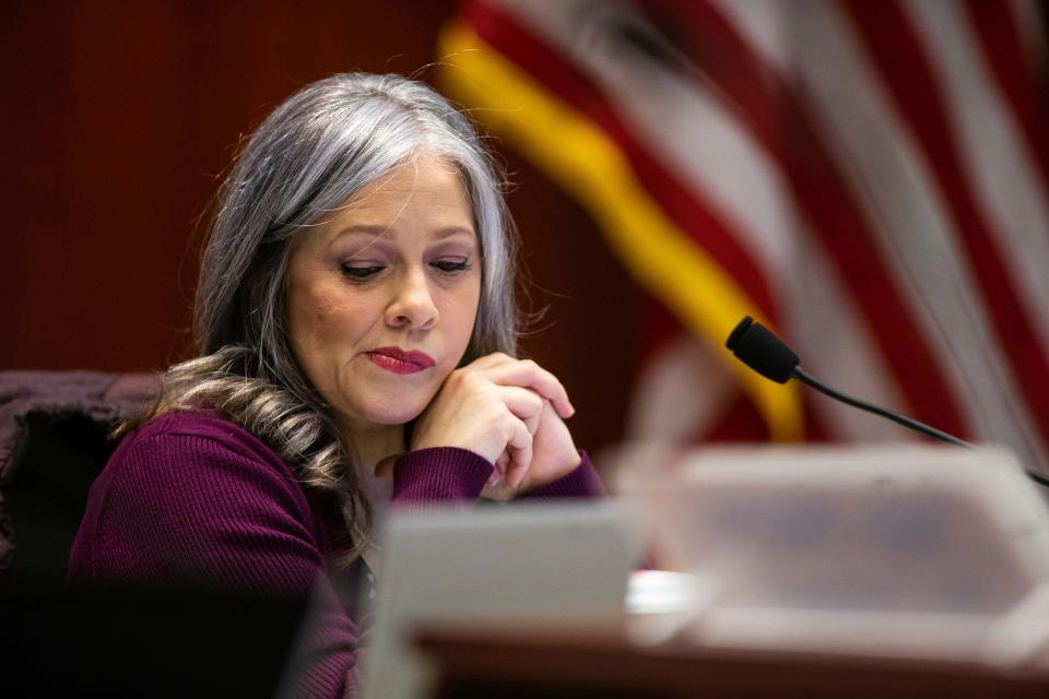 Commissioner Rebekah Curran listens to public comment Thursday, Feb. 16, in West Olive.