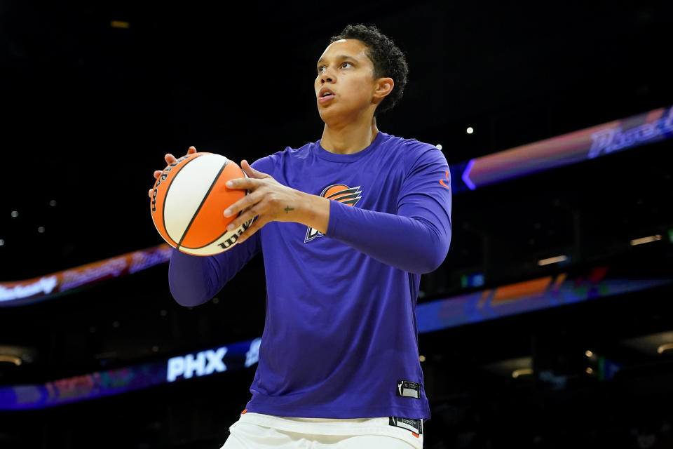 Phoenix Mercury center Brittney Griner warms up prior to a WNBA preseason basketball game against the Los Angeles Sparks, Friday, May 12, 2023, in Phoenix. (AP Photo/Matt York)