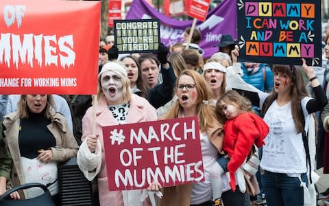 In October 2017, hundreds of women took part in a march to demand better rights for working mothers  - Credit: Wiktor Szymanowicz / Barcroft Images 