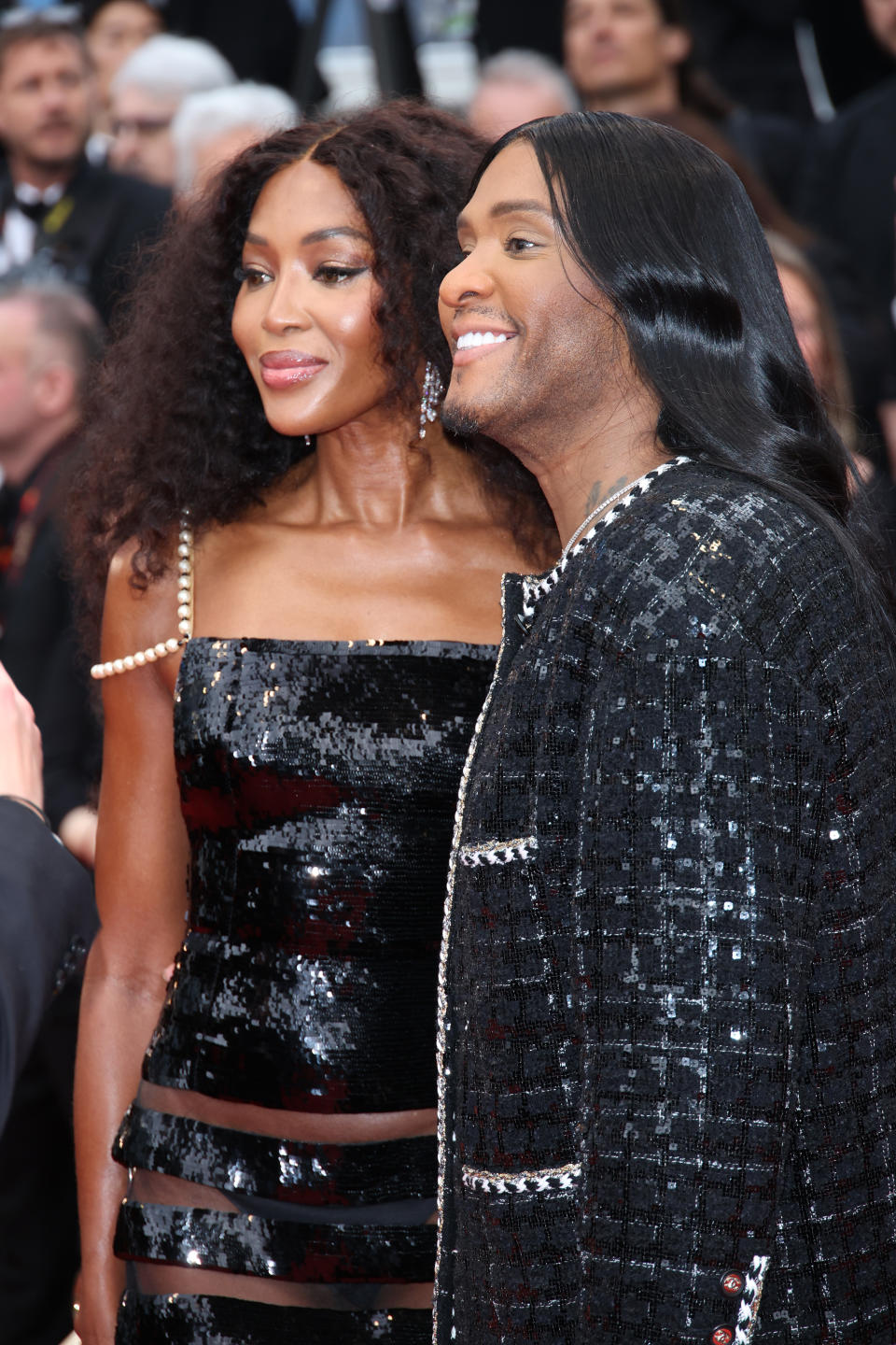 Naomi Campbell and Law Roach on the Cannes red carpet wearing Chanel