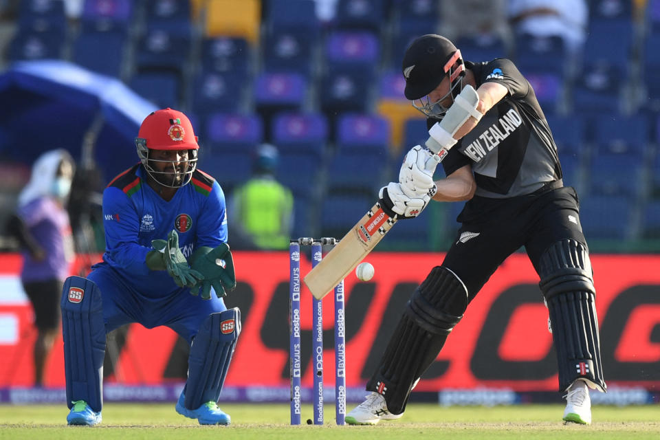 Pictured here, New Zealand captain Kane Williamson plays a shot as Afghanistan's wicketkeeper Mohammad Shahzad watches on at the T20 World Cup.