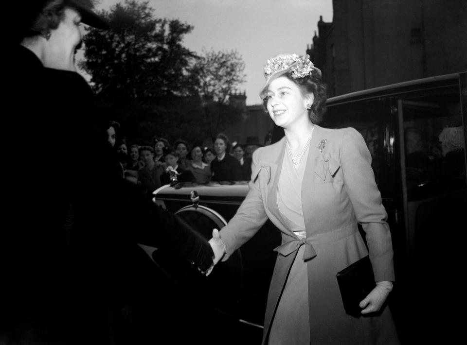 Embargoed to 2100 Friday May 08 File photo dated 25/05/46 of Queen Elizabeth II, then Princess Elizabeth, arriving at the Fourth Birthday Rally of the Girls' Training Corps, at the Royal Albert Hall. As the Queen spoke of the jubilant celebrations which "some of us experienced first-hand", she was no doubt thinking back to her own VE Day adventures.