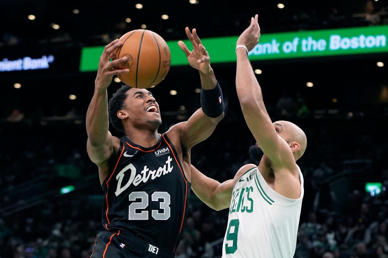 Detroit Pistons' Jaden Ivey (23) shoots against Boston Celtics' Derrick White (9) during the first half at TD Garden in Boston on Monday, March 18, 2024.