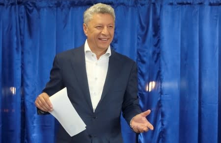 Leader of the Opposition Platform party Boyko visits a polling station during Ukraine's parliamentary election in Ivankovychi