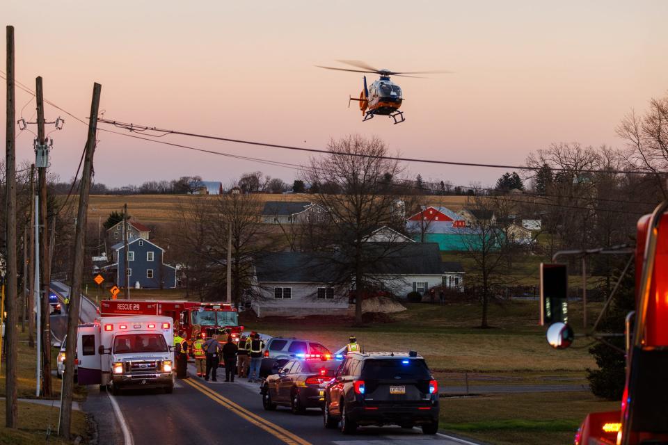 A medical helicopter airlifts a patient at the scene of a vehicle crash with entrapment on the 1900 block of Centennial Road, Sunday, Feb. 4, 2024, in Mount Pleasant Township.