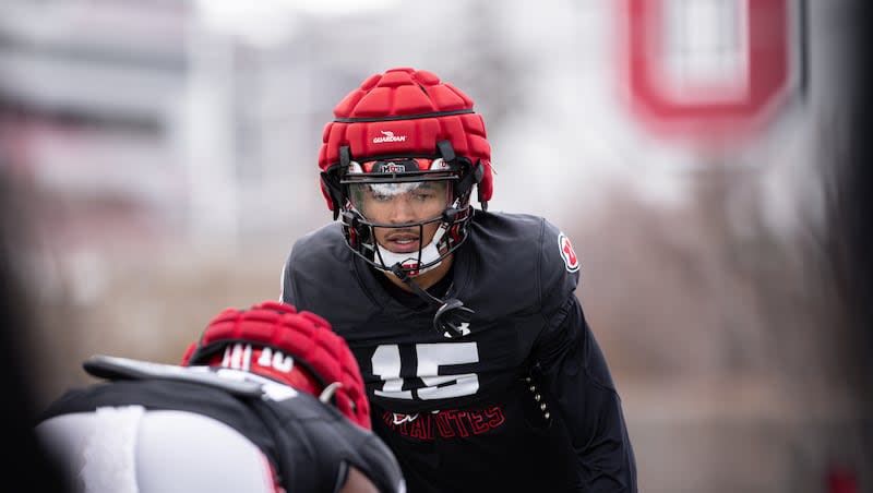 Tao Johnson practices during spring camp at the Spence and Cleone Eccles Football Center on Tuesday, March 26, 2024.