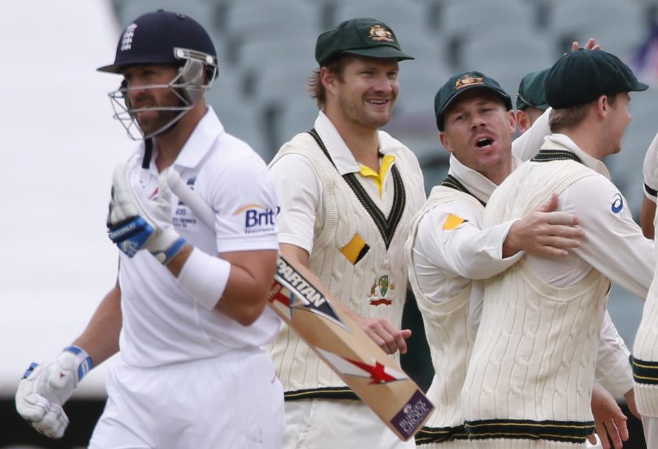 Australia's David Warner (2nd R) shouts at England's Matt Prior (L) as he and his team mates celebrate Prior's dismissal during the fifth day's play in the second Ashes cricket test at the Adelaide Oval December 9, 2013. REUTERS/David Gray (AUSTRALIA - Tags: SPORT CRICKET)