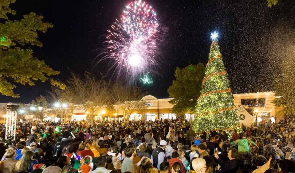 A crowd gathers for an annual Christmas celebration at The Shoppes at EastChase. The center was recently sold.