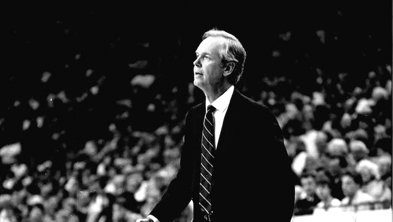 BYU basketball coach Frank Arnold coaches from the sidelines at the Marriott Center in Provo, Utah.