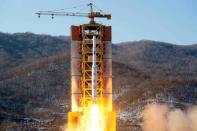 This picture released from North Korea's official Korean Central News Agency (KCNA) on February 7, 2016 shows North Korea's rocket launch of the earth observation satellite Kwangmyong 4 at an undisclosed location in North Korea