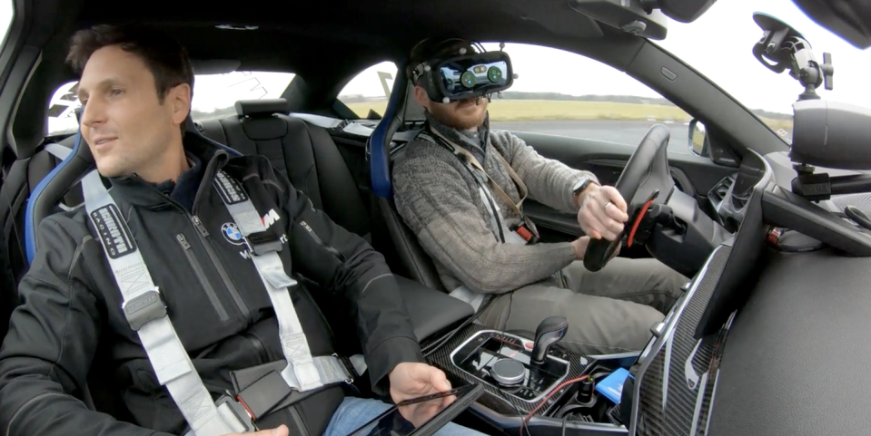 eric stafford driving a bmw m2 on a virtual racetrack