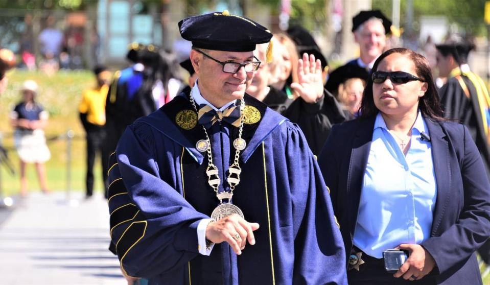 UC Merced Chancellor Dr. Juan Sanchez Munoz makes his way to the stage during the 2022 UC Merced Graduation Ceremony on Saturday, May 14, 2022 at UC Merced in Merced, Calif. 