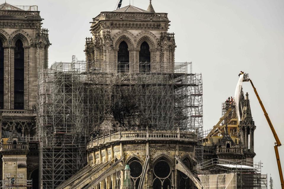 President Macron has vowed to rebuild the cathedral within five years (AFP/Getty Images)