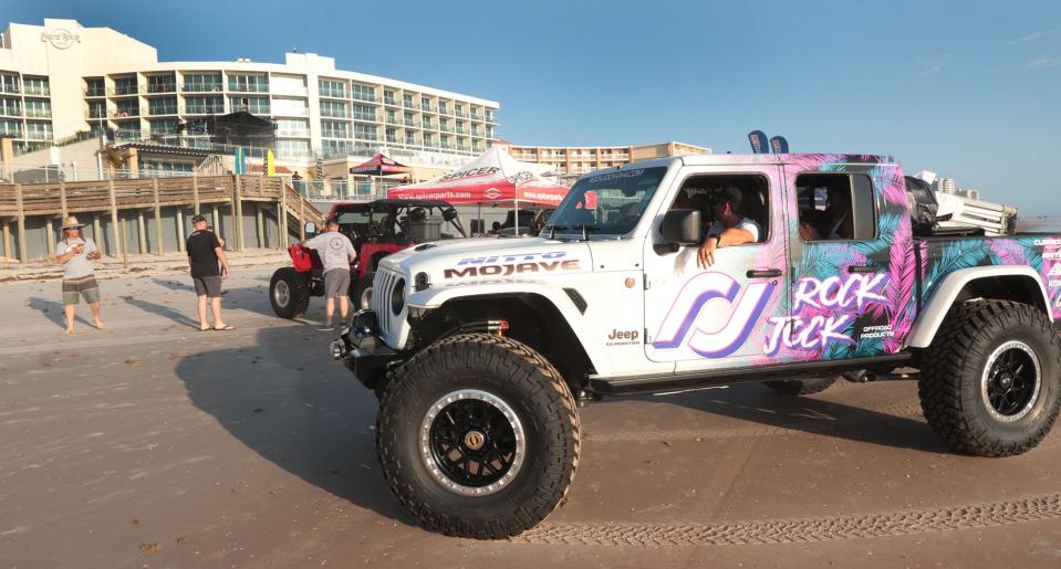 Jeep fans gather on the dand behind Hard Rock Hotel in Daytona Beach during Jeep Beach 2023. The annual event returns April 19-28 in Daytona Beach.