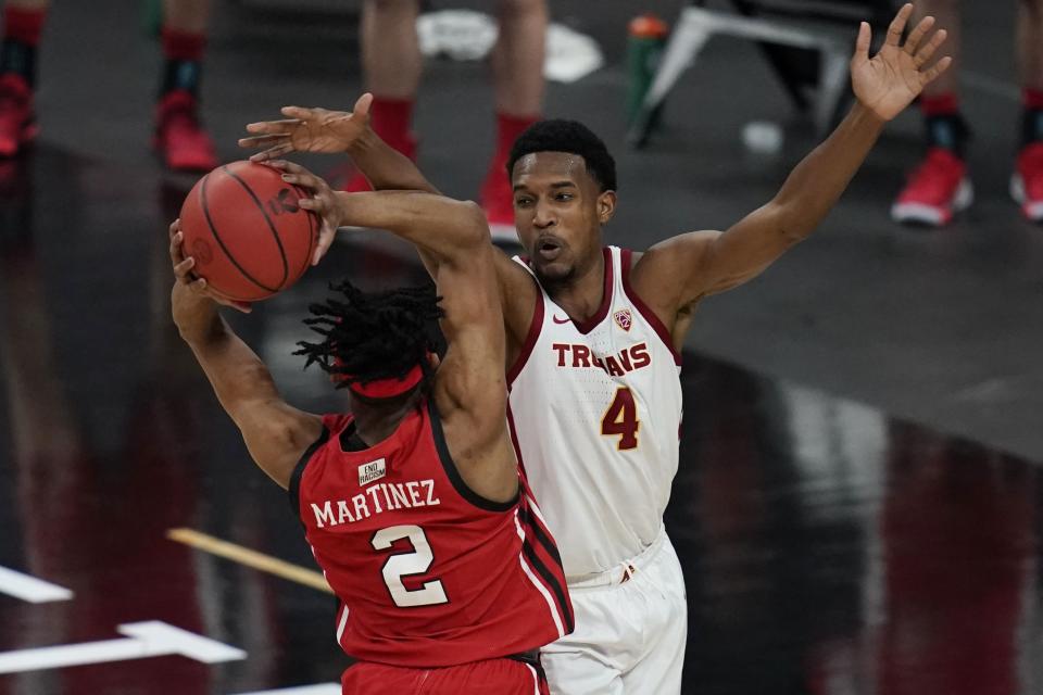 USC’s Evan Mobley (4) guards Utah’s Ian Martinez during the quarterfinal round of the Pac-12 tournament Thursday, March 11, 2021, in Las Vegas. Martinez, a freshman for the Runnin’ Utes at the time, scored a then career-high 18 points against the Trojans. | John Locher, Associated Press