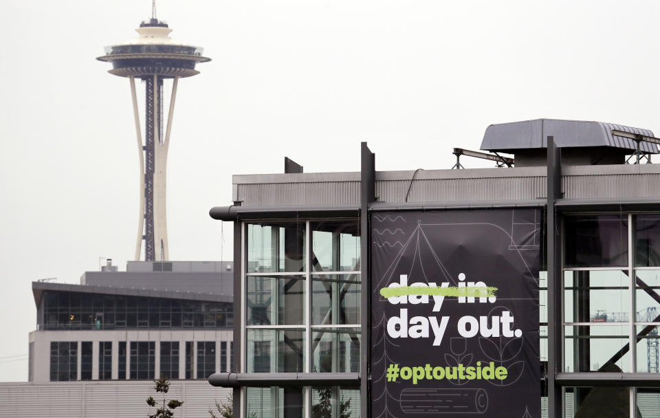 REI's flagship Seattle store with a banner announcing its plan to close on Black Friday 2018. (Photo: ASSOCIATED PRESS/Elaine Thompson)