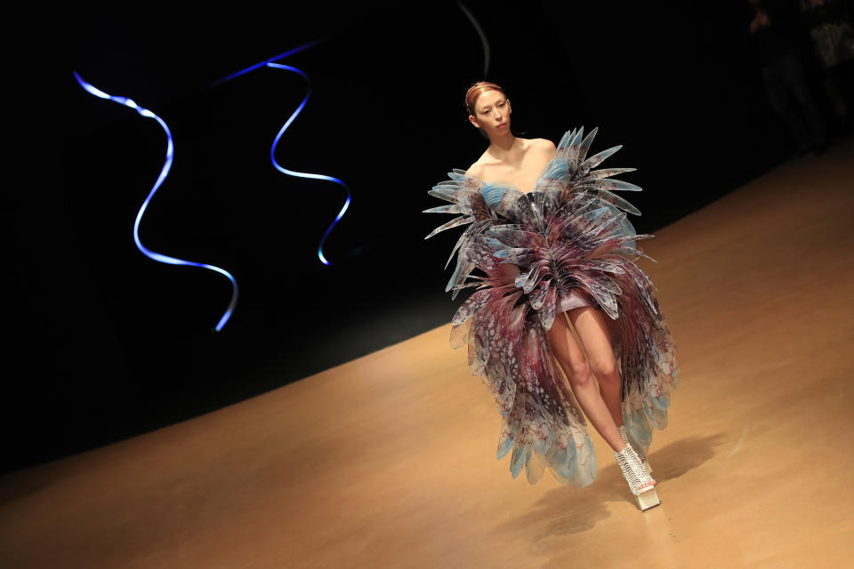 A model wears a creation for Iris van Herpen Haute Couture Spring/Summer 2020 fashion collection presented Monday Jan.20, 2020 in Paris (AP Photo/Michel Euler)