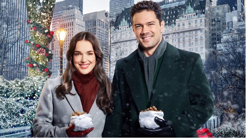 <span><span>Elizabeth Henstridge and Ryan Paevey in <em>Christmas at the Plaza</em></span><span>Hallmark</span></span>