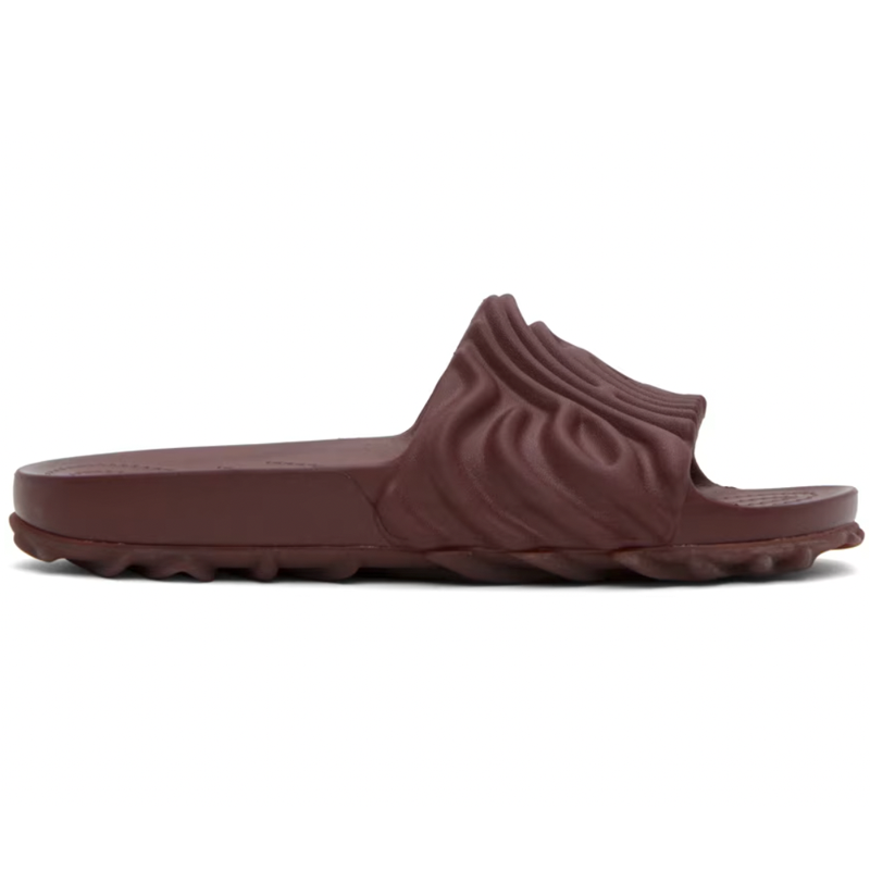 <p><a href="https://go.redirectingat.com?id=74968X1596630&url=https%3A%2F%2Fwww.ssense.com%2Fen-us%2Fmen%2Fproduct%2Fcrocs%2Fburgundy-salehe-bembury-edition-pollex-slides%2F15487061&sref=https%3A%2F%2F" rel="nofollow noopener" target="_blank" data-ylk="slk:Shop Now;elm:context_link;itc:0;sec:content-canvas" class="link ">Shop Now</a></p><p>Burgundy Salehe Bembury Edition Pollex Slides</p><p>$48.00</p>