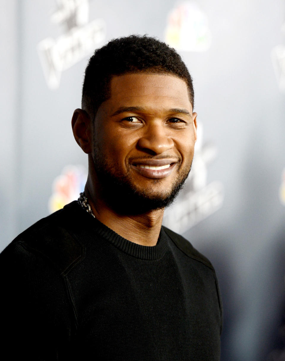 LOS ANGELES, CA - MARCH 20:  Singer Usher arrives at a screening of NBC's 'The Voice' Season 4 at the Chinese Theatre on March 20, 2013 in Los Angeles, California.  (Photo by Kevin Winter/Getty Images)