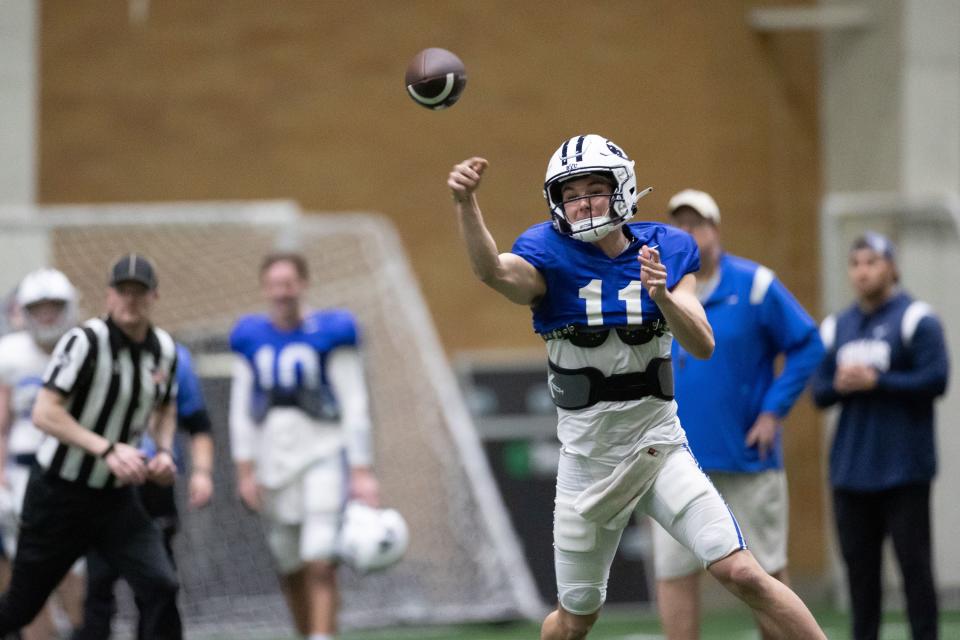 BYU QB Cade Fennegan throws the ball during spring practice at the Indoor Practice Facility in Provo on March 10, 2023. | Ryan Sun, Deseret News