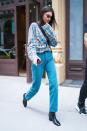<p>The model wore a relaxed plaid shirt whilst out in New York.</p>