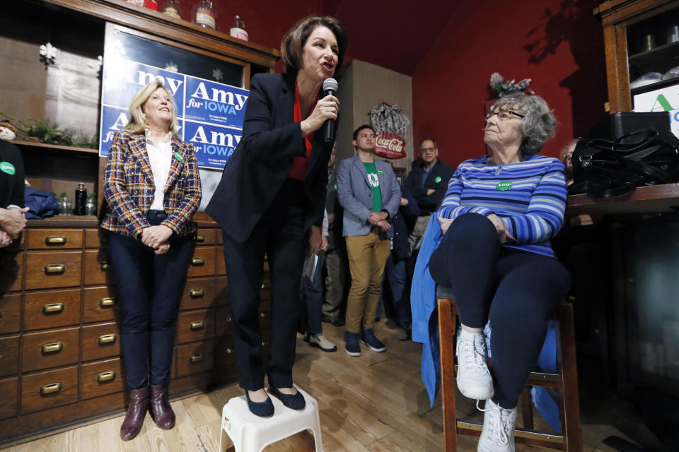 FILE - In this Dec. 6, 2019, file photo, Democratic presidential candidate Sen. Amy Klobuchar, D-Minn., speaks during a stop at the Corner Sundry in Indianola, Iowa. Democrat Amy Klobuchar says she will become the first major 2020 candidate to have visited all 99 Iowa counties after stops scheduled for Friday in the lead off caucus state. (AP Photo/Charlie Neibergall, File)