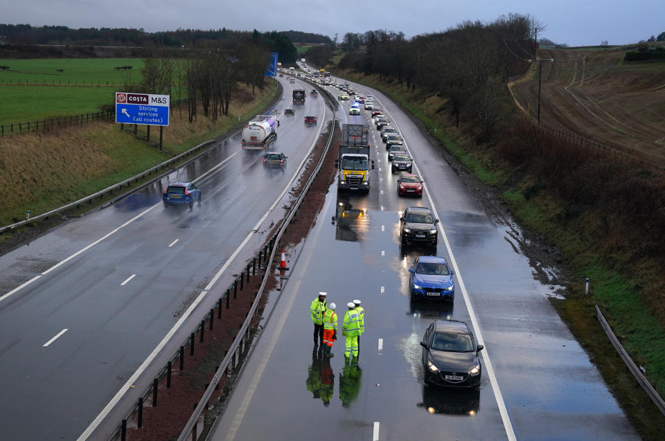 Police are in attendance as flood water is cleared from the M9 at Stirling. Storm Gerrit will bring strong winds and heavy rain to many parts of the UK on Wednesday, with wintry hazards also likely, forecasters warned. Picture date: Wednesday December 27, 2023. (Photo by Andrew Milligan/PA Images via Getty Images)