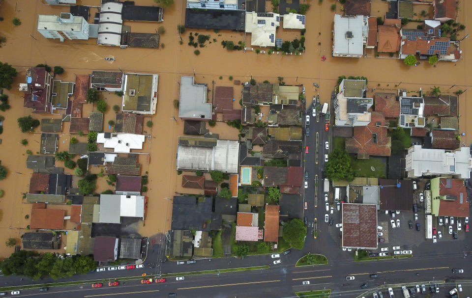 Streets are flooded after heavy rain in Sao Sebastiao do Cai, Rio Grande do Sul state, Brazil, Thursday, May 2, 2024. (AP Photo/Carlos Macedo)