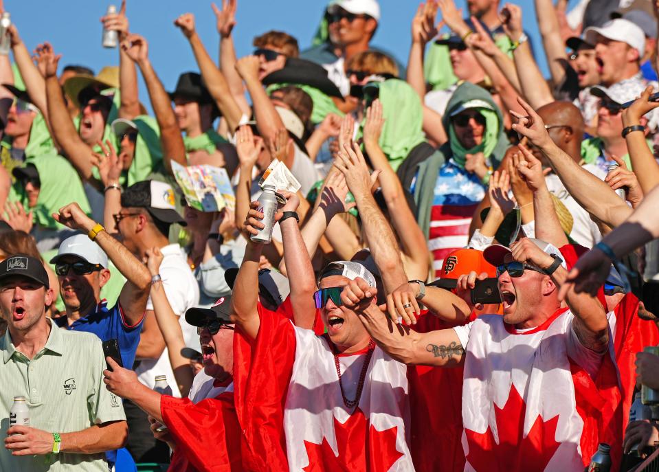 Feb 12, 2022; Scottsdale Arizona, USA; Fans react to a birdie putt on the 16th hole during Round 3 at the WM Phoenix Open. Mandatory Credit: Patrick Breen-The Republic