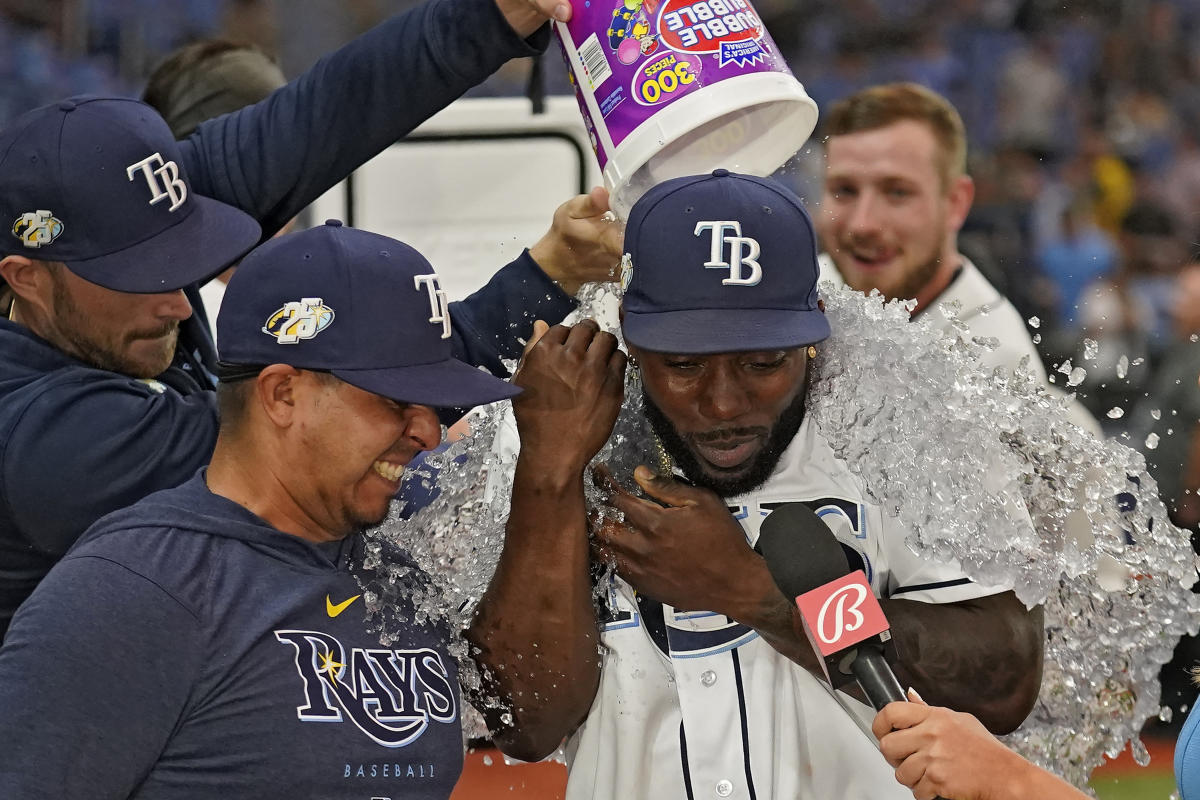 Rays rally in 9th to earn first win of season