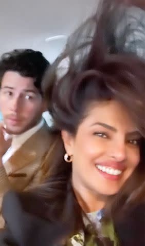 <p>Nick Jonas/Instagram</p> Priyanka Chopra Jonas posing after husband Nick Jonas successfully removed her ponytail.